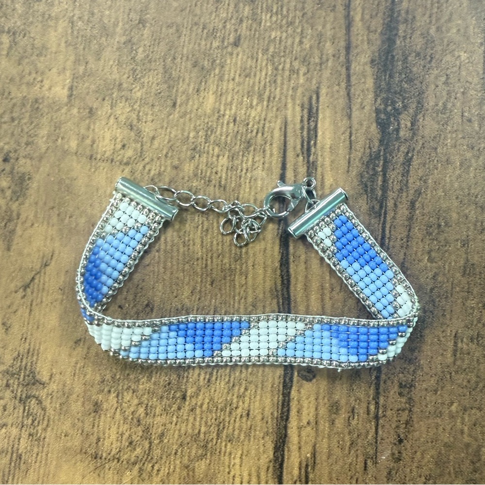 Blue and silver hand woven bracelet with size expander